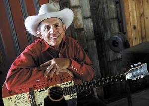 Monte Mills with autographed guitar